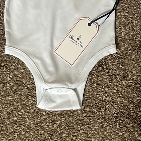 NWT Classic Prep Long Sleeve Izzy Onesie. Bright White with Crimson Ric Rac. - Picture 2 of 6